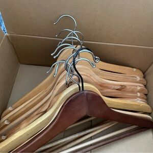 Eleven wooden hangers